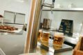 Beer trolley with tap system and beer on stainless steel counter
