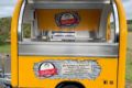 Yellow food trailer in retro design