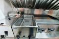 Grill, deep fryer and extractor fan in the BuddyStar food trailer