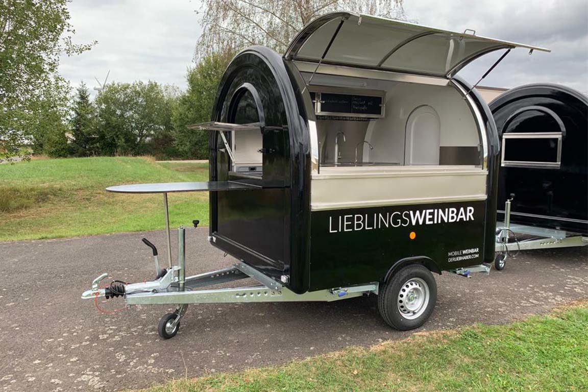 Mobile wine bar Wine sales trailer in retro look