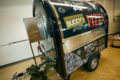 Pizzavagn med stängd försäljningsklapp och foliering